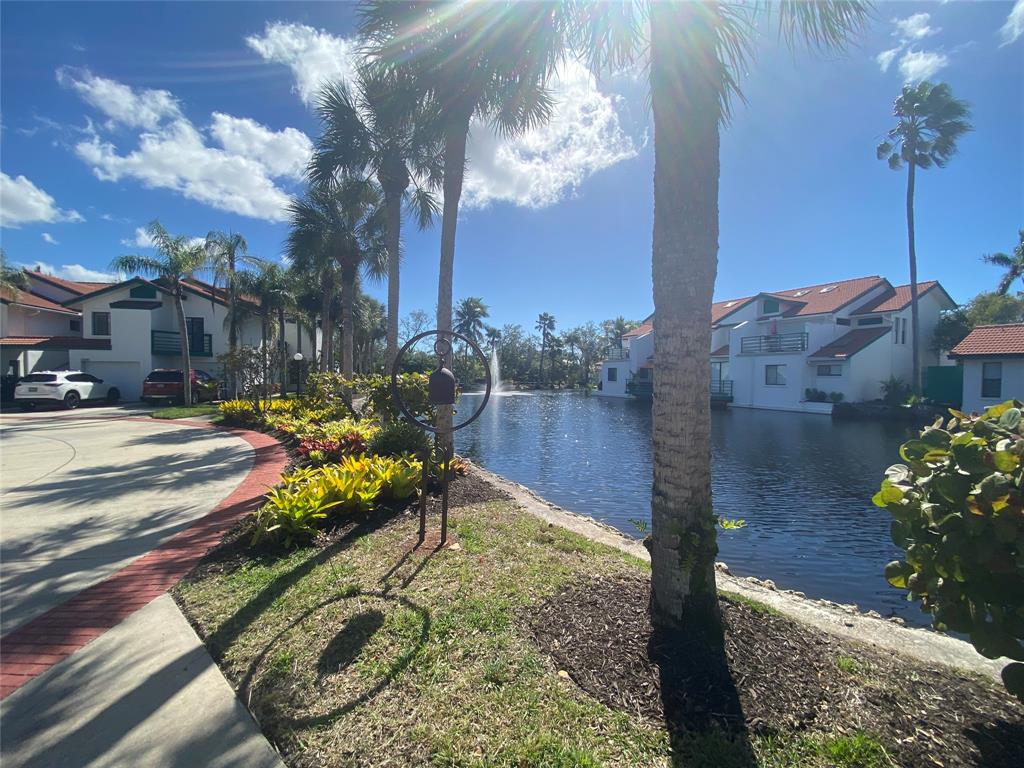 2286 Anchorage Lane, Unit A Naples, FL 34104 - Photo 36 of 41 a view of a park with large trees