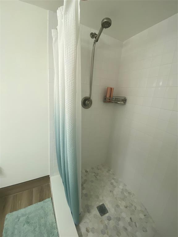 2286 Anchorage Lane, Unit A Naples, FL 34104 - Photo 5 of 41 a bathroom with a shower