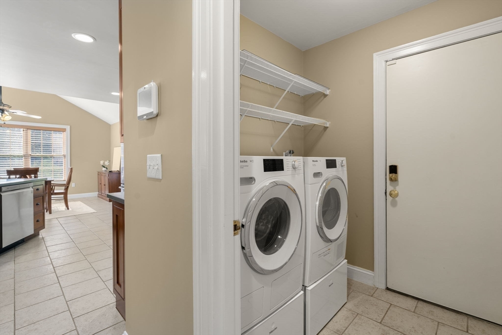1 Austin Way Natick, MA 01760 - Photo 15 of 27 a view of a kitchen with washer and dryer