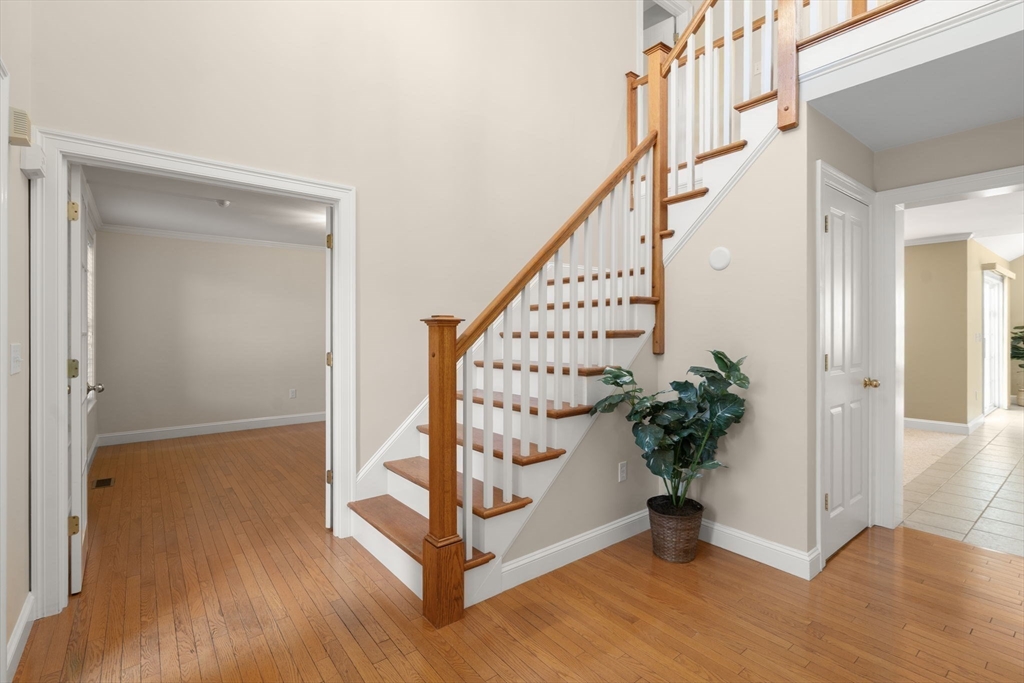 1 Austin Way Natick, MA 01760 - Photo 4 of 27 a view of entryway with wooden floor