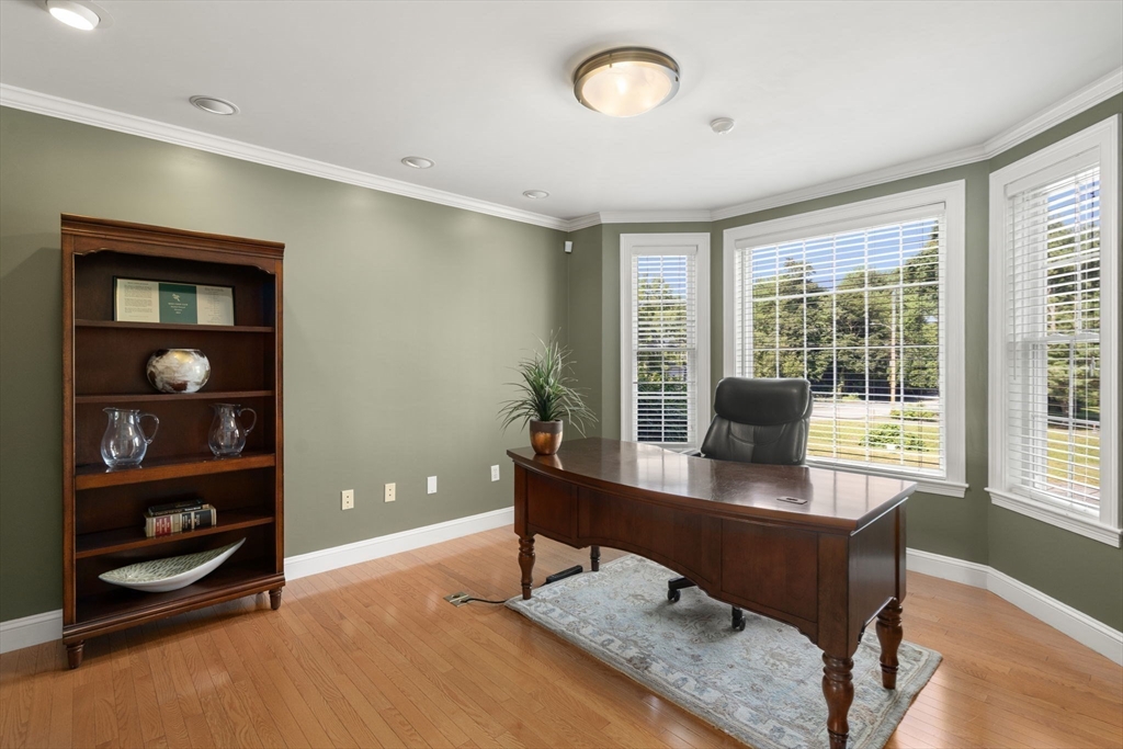 1 Austin Way Natick, MA 01760 - Photo 5 of 27 a view of a workspace with furniture and a window