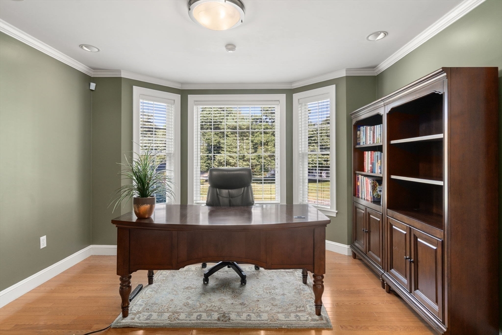 1 Austin Way Natick, MA 01760 - Photo 6 of 27 a view of a livingroom with furniture and a potted plant