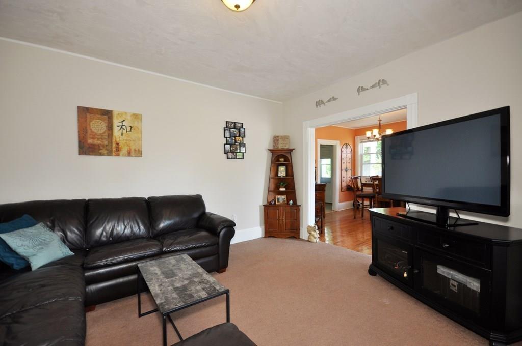 28 Ayer Road Shirley, MA 01464 - Photo 11 of 20 a living room with furniture and a flat screen tv