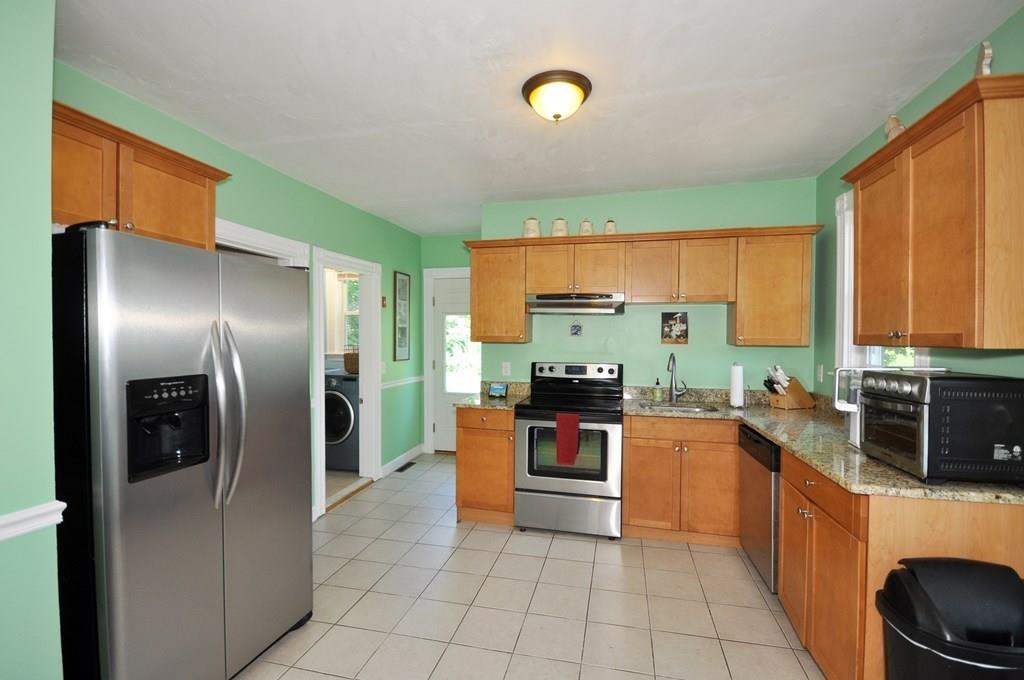 28 Ayer Road Shirley, MA 01464 - Photo 12 of 20 a kitchen with stainless steel appliances granite countertop a stove a refrigerator and a sink