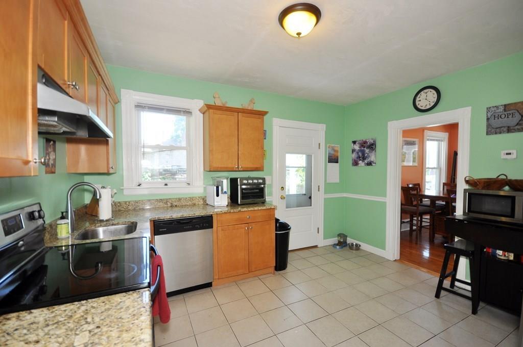 28 Ayer Road Shirley, MA 01464 - Photo 13 of 20 a kitchen with a sink a counter top space and appliances