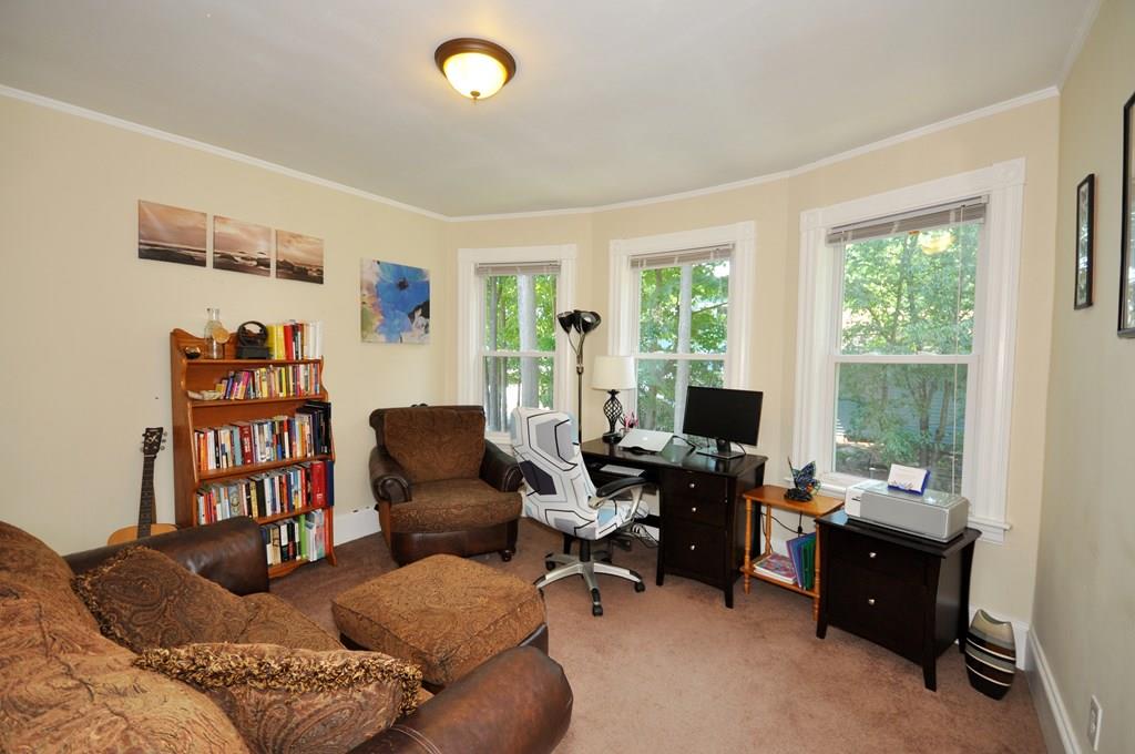 28 Ayer Road Shirley, MA 01464 - Photo 15 of 20 a living room with furniture and a flat screen tv
