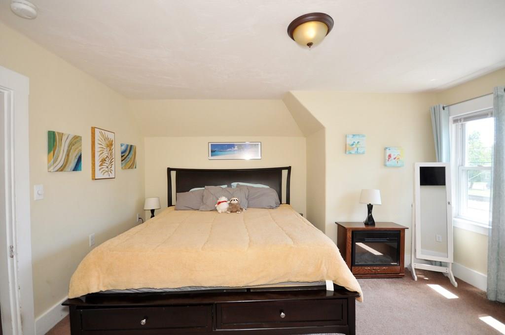 28 Ayer Road Shirley, MA 01464 - Photo 16 of 20 a bedroom with a bed and a window
