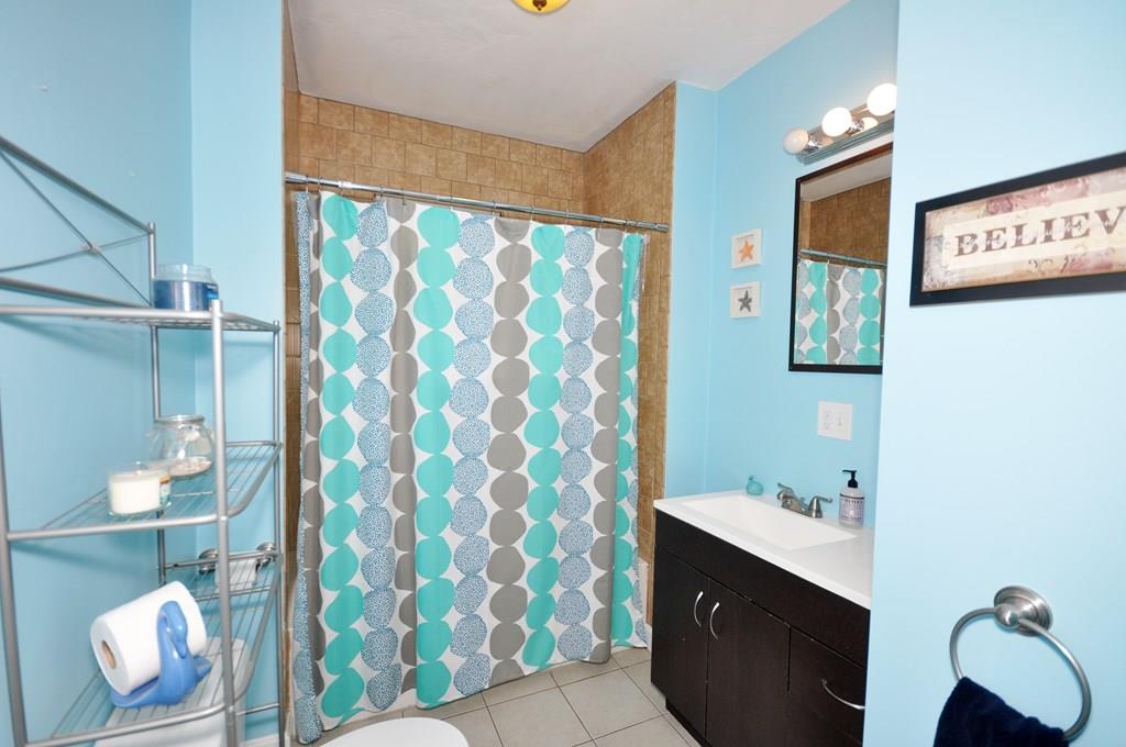 28 Ayer Road Shirley, MA 01464 - Photo 19 of 20 a bathroom with a sink and a mirror