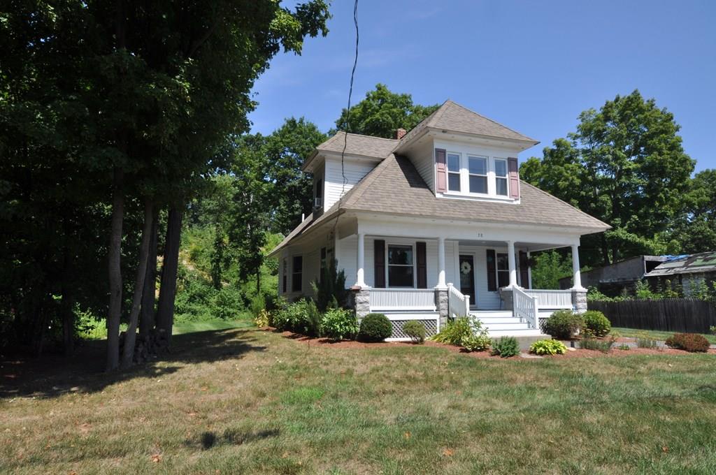28 Ayer Road Shirley, MA 01464 - Photo 3 of 20 a front view of a house with yard and green space