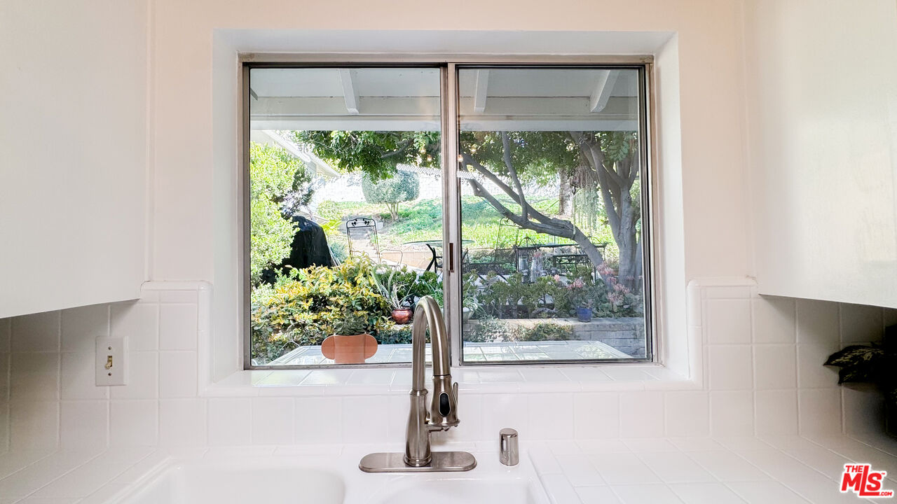 13529 Beverly Boulevard Whittier, CA 90601 - Photo 22 of 54 a view of a room that has a bed and a window