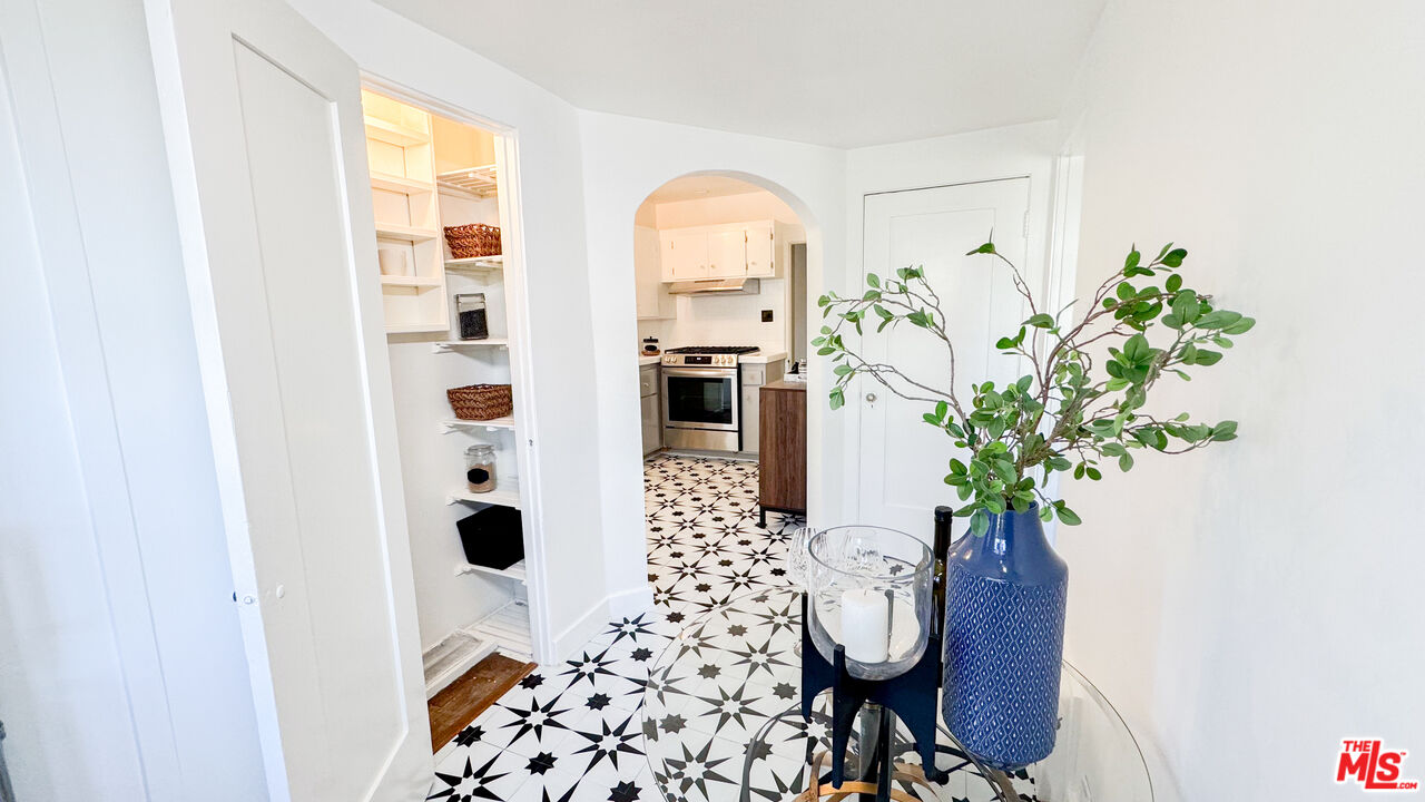 13529 Beverly Boulevard Whittier, CA 90601 - Photo 26 of 54 a view of entryway with paintings on the wall