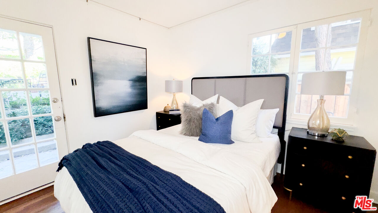 13529 Beverly Boulevard Whittier, CA 90601 - Photo 29 of 54 a bedroom with bed and window