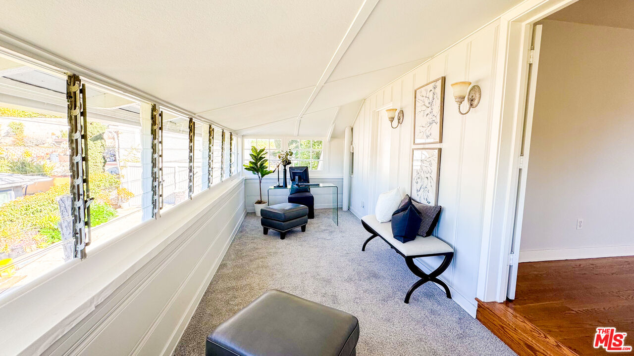 13529 Beverly Boulevard Whittier, CA 90601 - Photo 48 of 54 a living room with furniture and a large window
