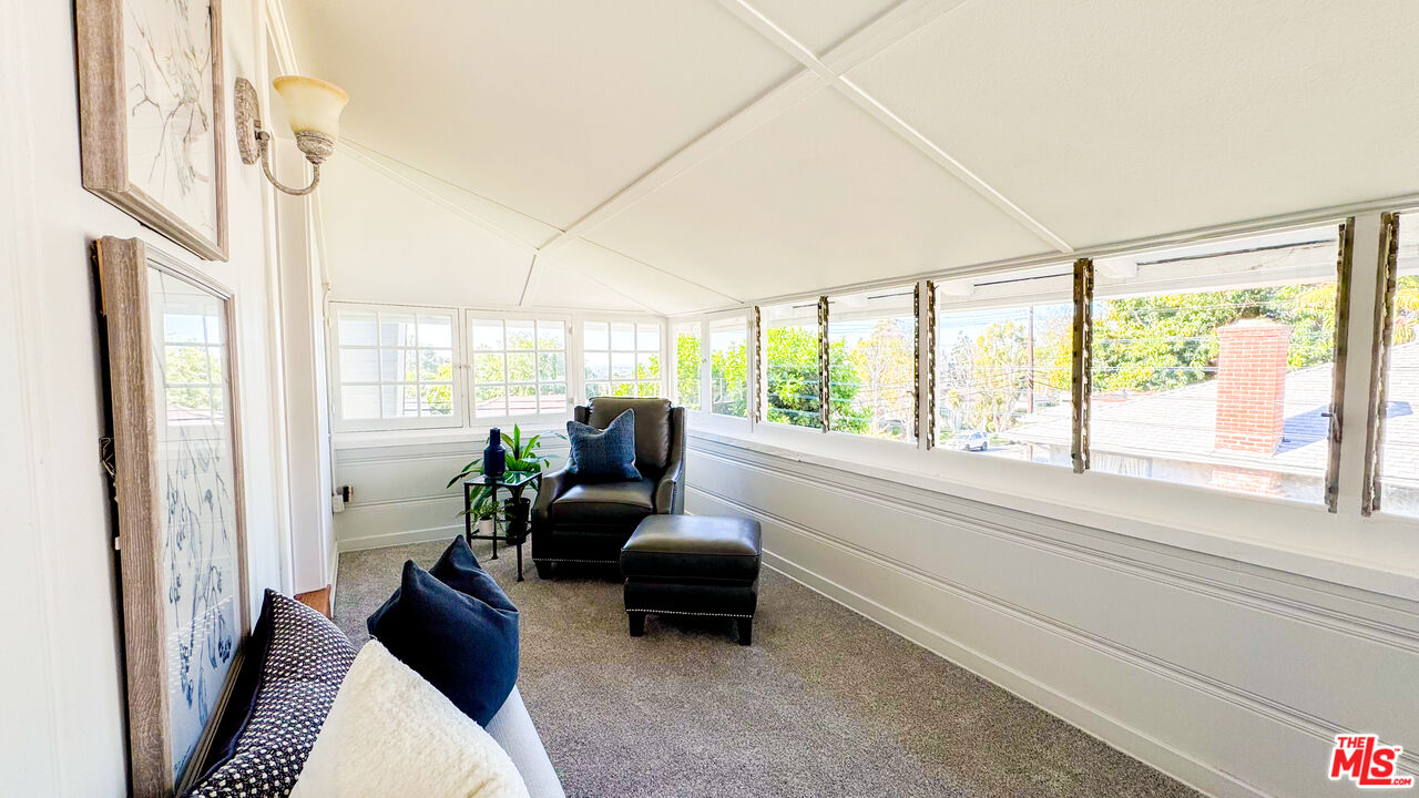 13529 Beverly Boulevard Whittier, CA 90601 - Photo 49 of 54 a living room with furniture and a large window