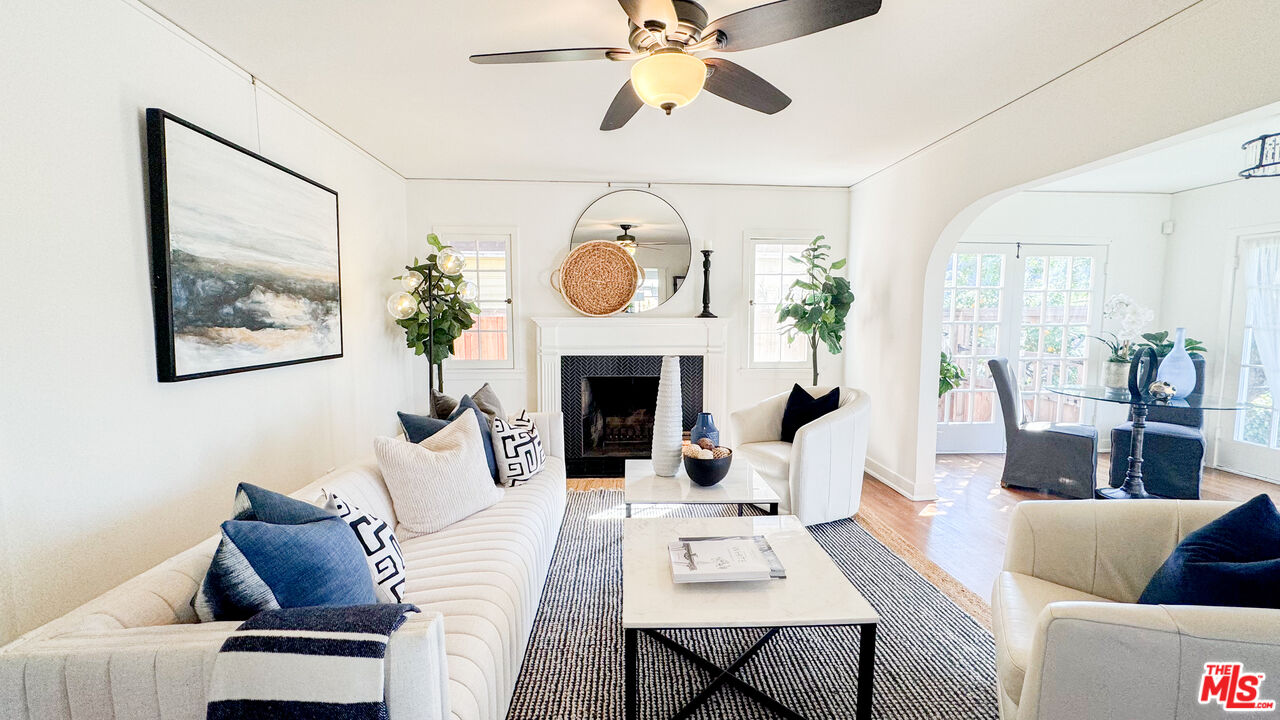 13529 Beverly Boulevard Whittier, CA 90601 - Photo 5 of 54 a living room with furniture and a fireplace