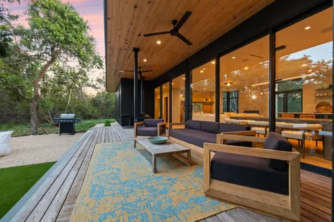 aerial view of a house with a yard