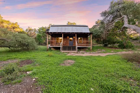 a view of living room with furniture and flat screen tv