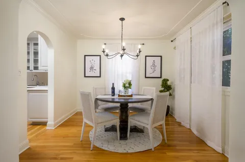 a view of a dining room with furniture