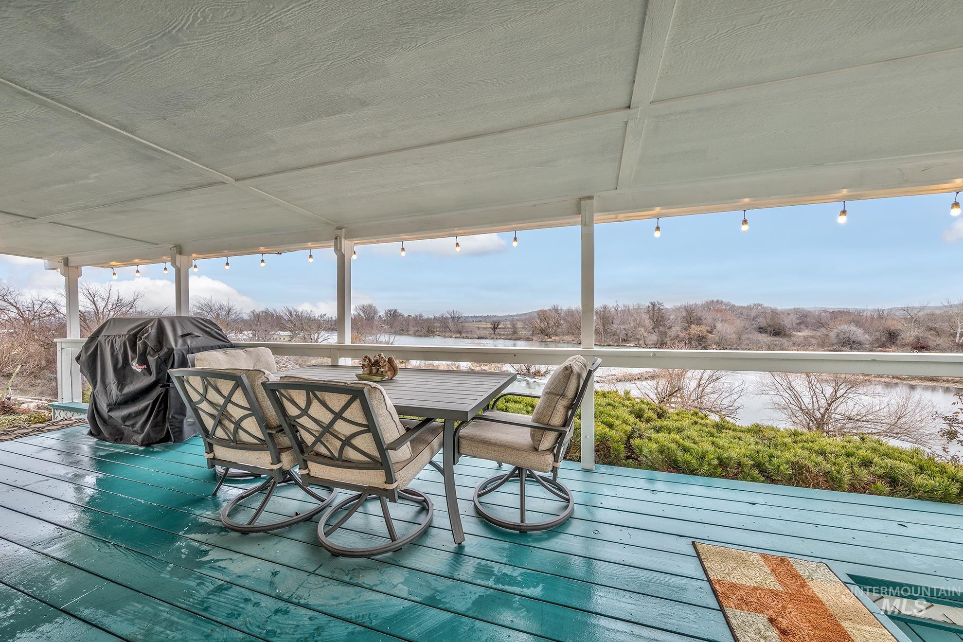 2750 Alden Road, Unit 27 Fruitland, ID 83619 - Photo 35 of 45 Deck with area for grilling and outdoor dining area