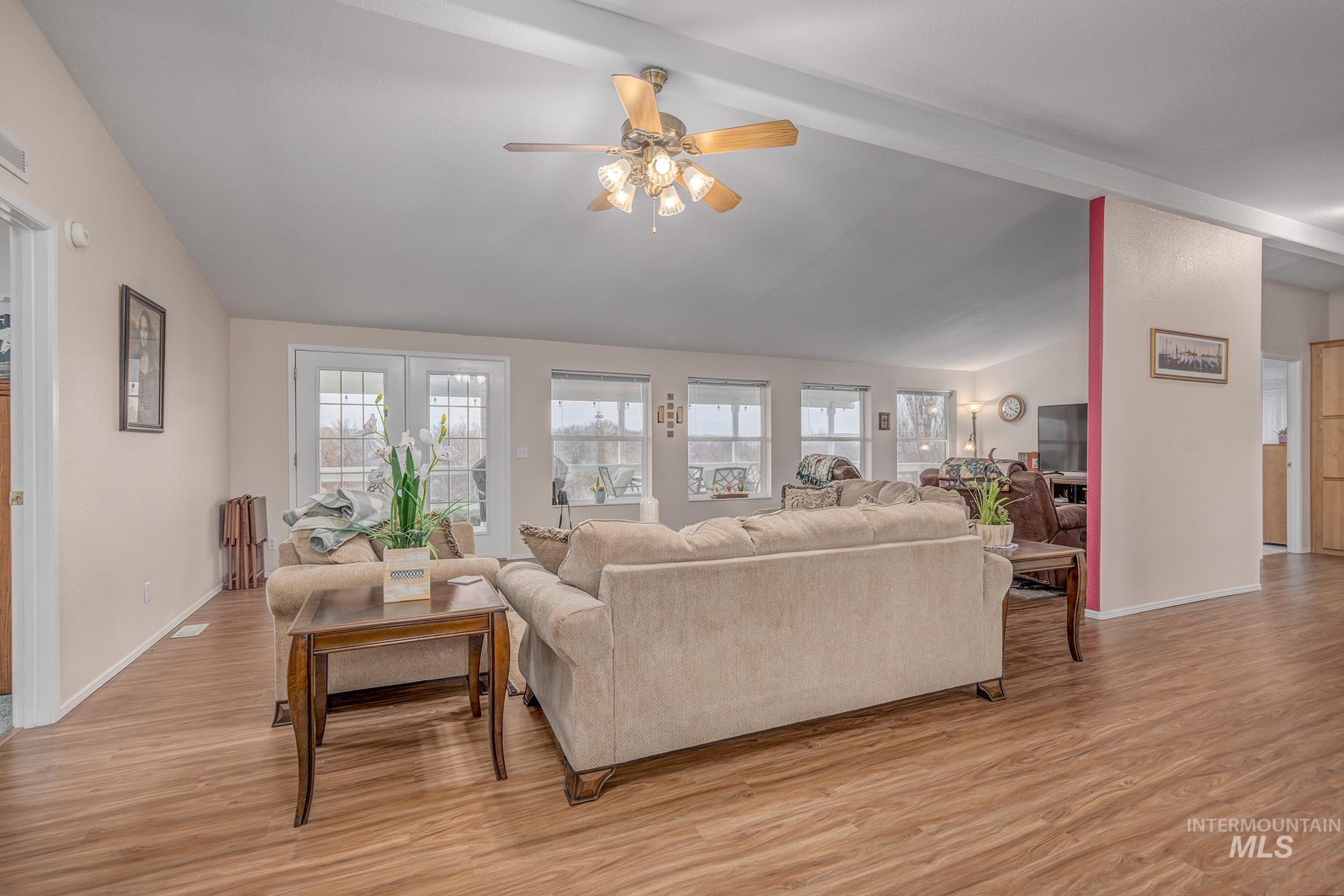2750 Alden Road, Unit 27 Fruitland, ID 83619 - Photo 9 of 45 Living area with light wood-style floors and a ceiling fan