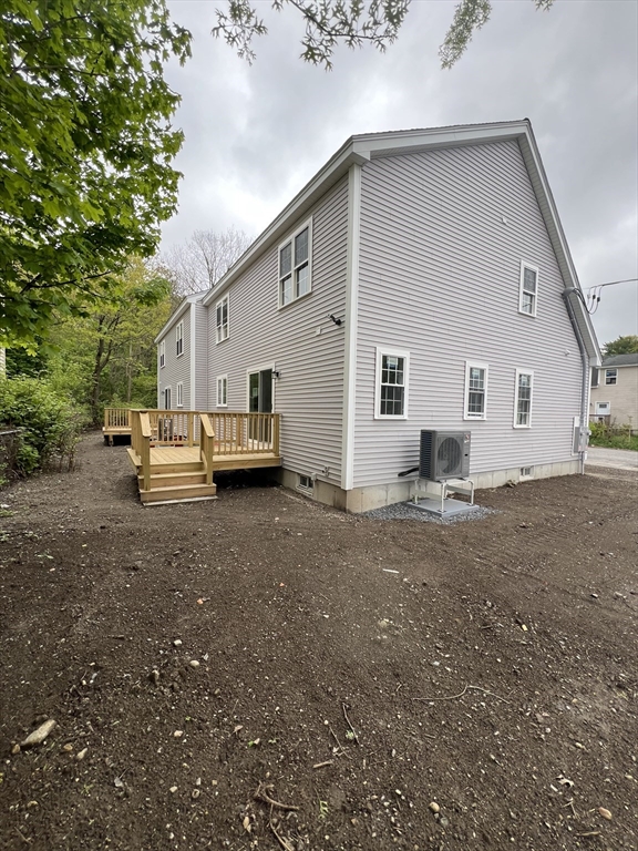 39 Lincoln Street, Unit A / B Webster, MA 01570 - Photo 33 of 33 a view of a house with backyard