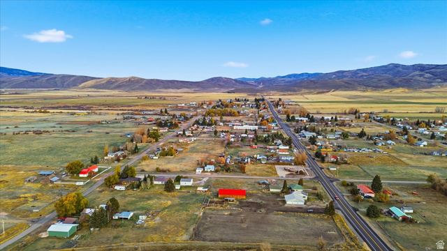 165 Main Street Georgetown, ID 83239 - Photo 43 of 50 Aerial overview of property's location featuring a mountain backdrop and rural landscape