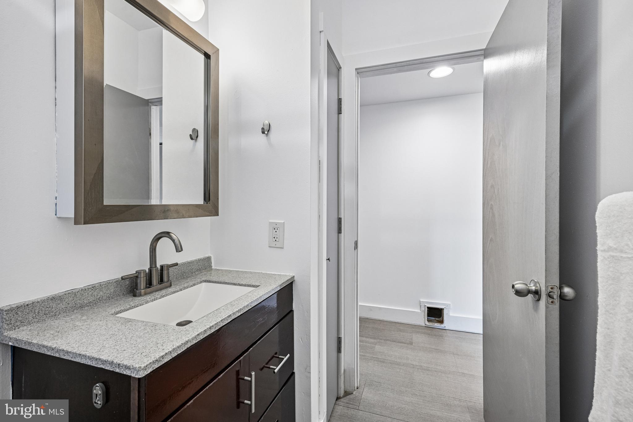 11 Forklanding Road Cinnaminson, NJ 08077 - Photo 41 of 77 a bathroom with a sink and a mirror