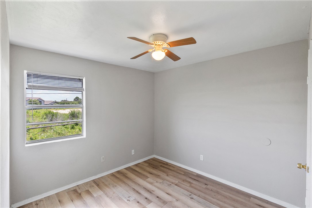 2808 Cypress Bend Circle, Unit A Bryan, TX 77801 - Photo 12 of 15 a view of room with window and ceiling fan
