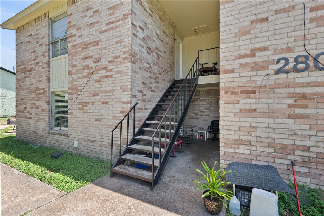 2808 Cypress Bend Circle, Unit A Bryan, TX 77801 - Photo 2 of 15 a view of a bench with wooden floor