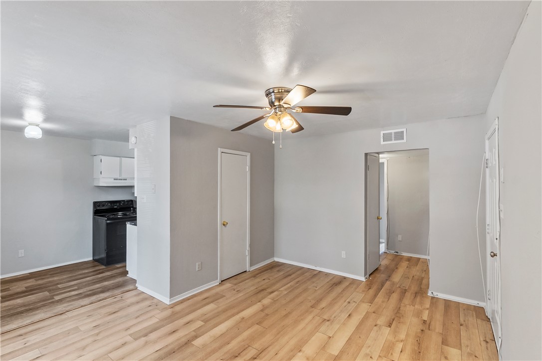 2808 Cypress Bend Circle, Unit A Bryan, TX 77801 - Photo 5 of 15 a view of empty room with wooden floor