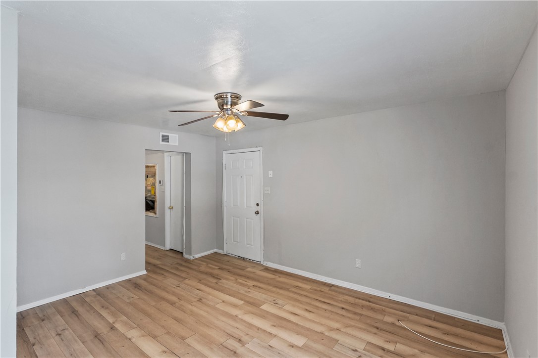 2808 Cypress Bend Circle, Unit A Bryan, TX 77801 - Photo 6 of 15 a view of empty room with wooden floor