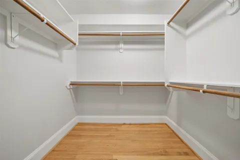 a bathroom with a shower and toilet