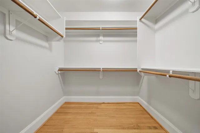 a bathroom with a shower and toilet