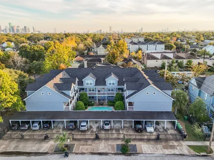 an aerial view of a house with a outdoor space