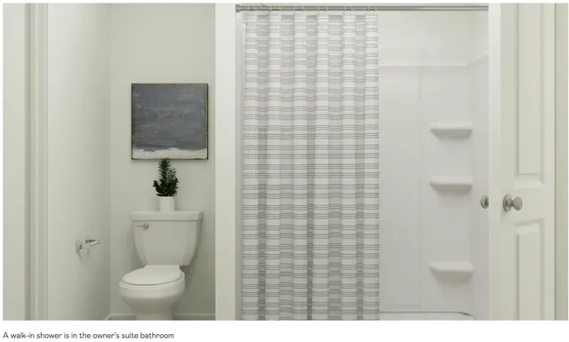 a bathroom with a sink vanity and a mirror