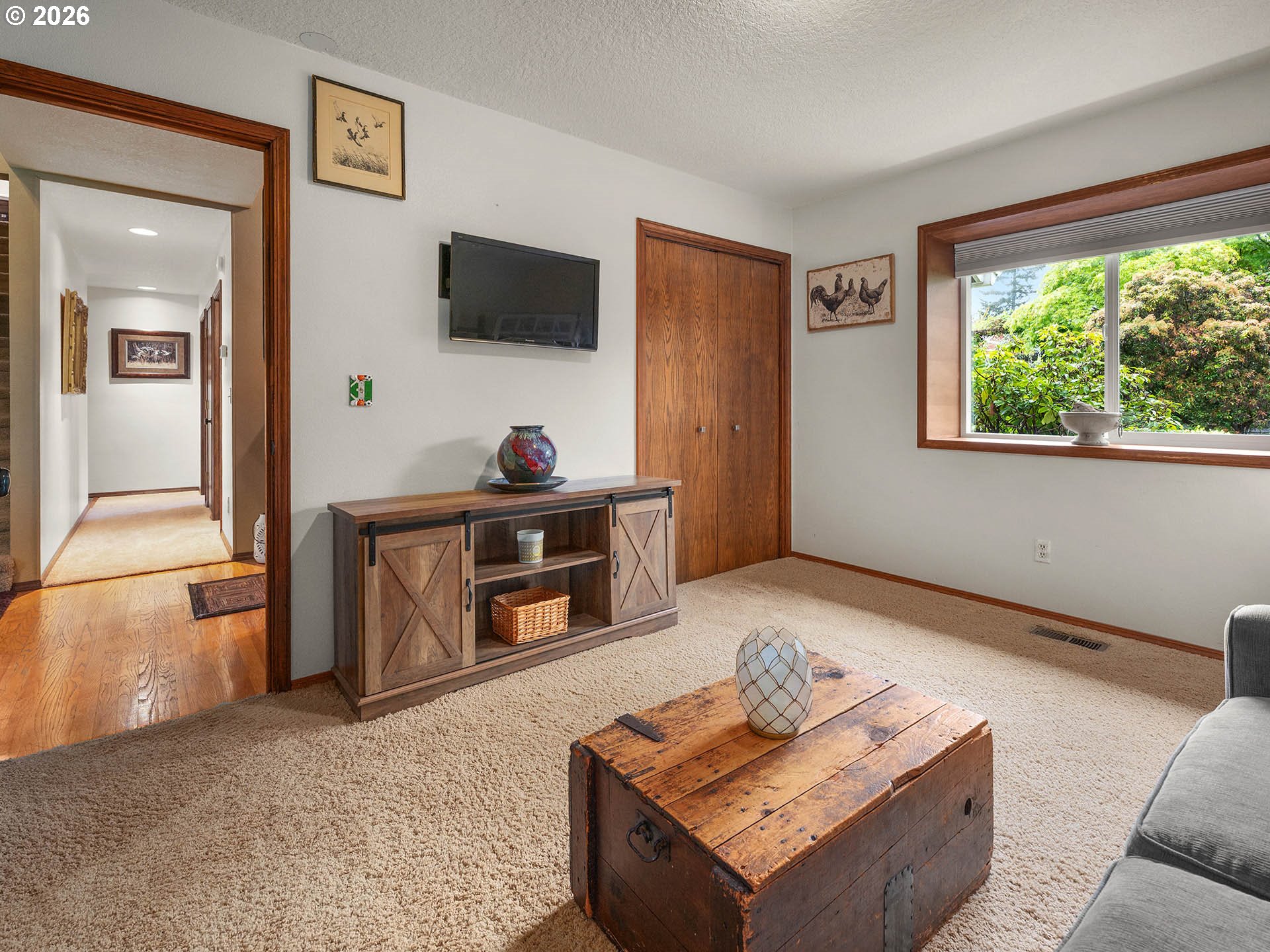 45045 Northwest Elk Mountain Road Banks, OR 97106 - Photo 17 of 48 a living room with furniture and a flat screen tv