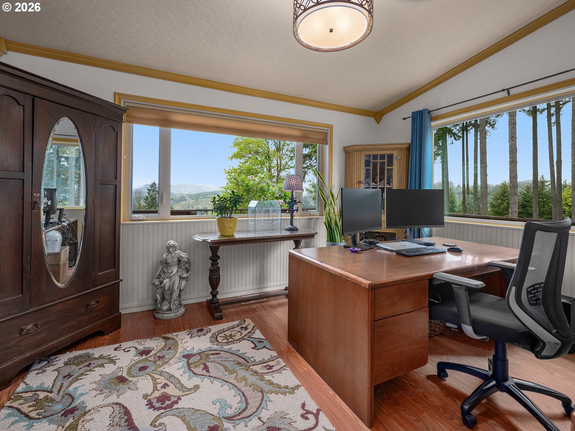 45045 Northwest Elk Mountain Road Banks, OR 97106 - Photo 20 of 48 a view of a workspace with furniture and a window