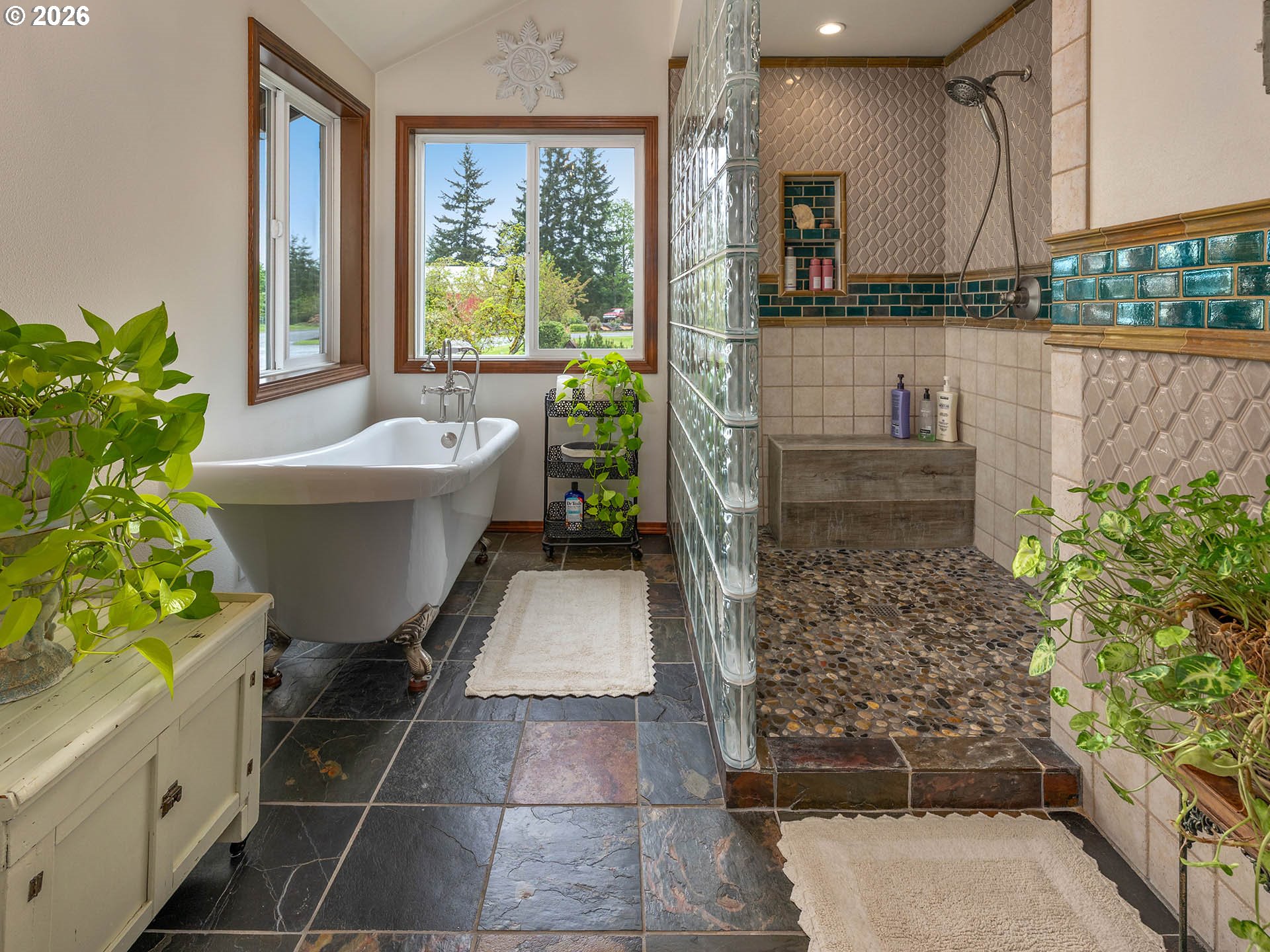 45045 Northwest Elk Mountain Road Banks, OR 97106 - Photo 23 of 48 a bathroom with a bathtub and shower
