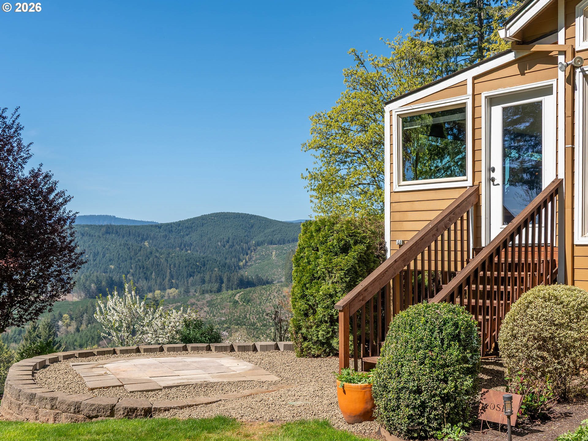 45045 Northwest Elk Mountain Road Banks, OR 97106 - Photo 28 of 48 a view of a house with a yard and potted plants