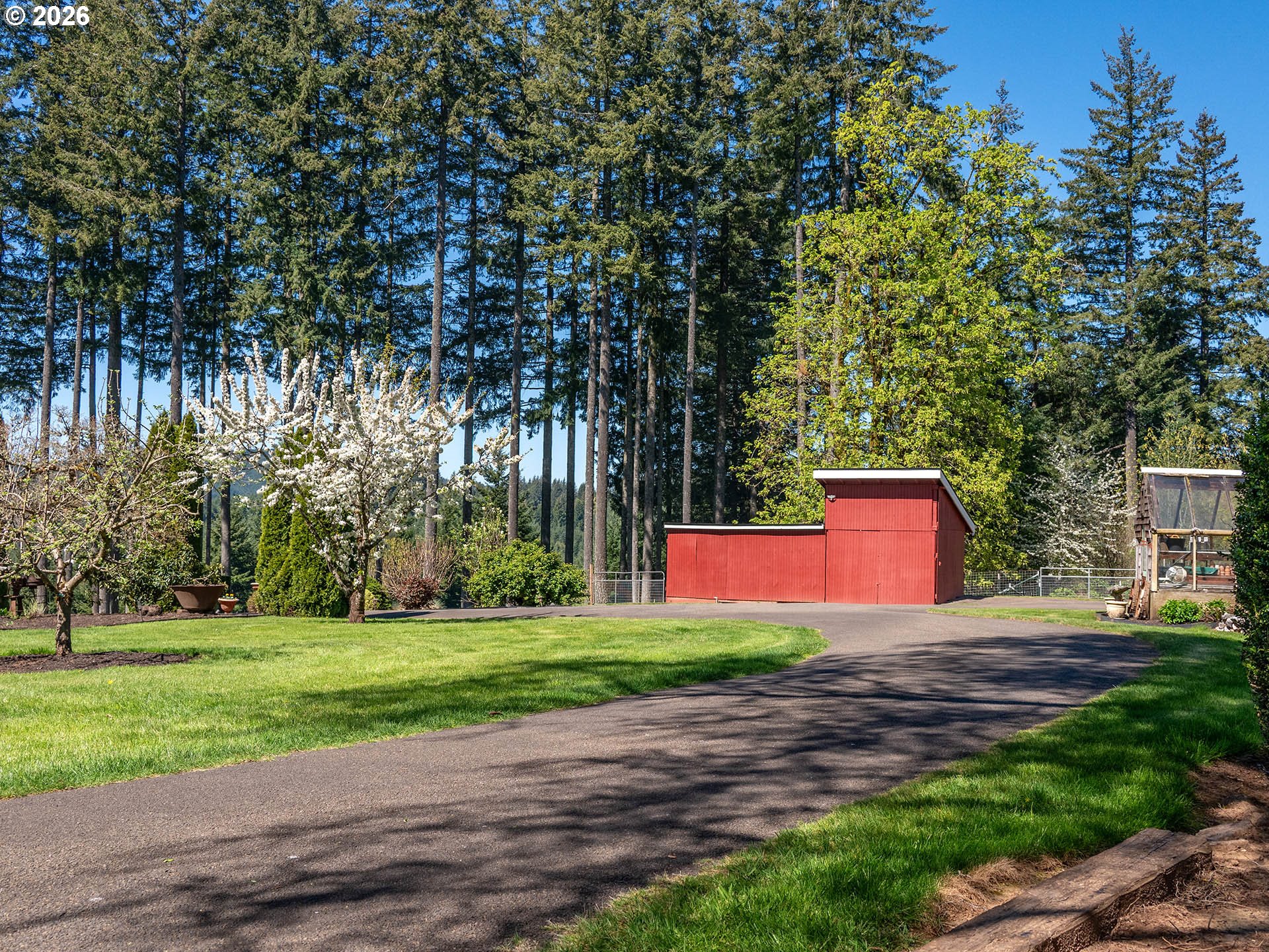 45045 Northwest Elk Mountain Road Banks, OR 97106 - Photo 33 of 48 a front view of a house with yard and tree