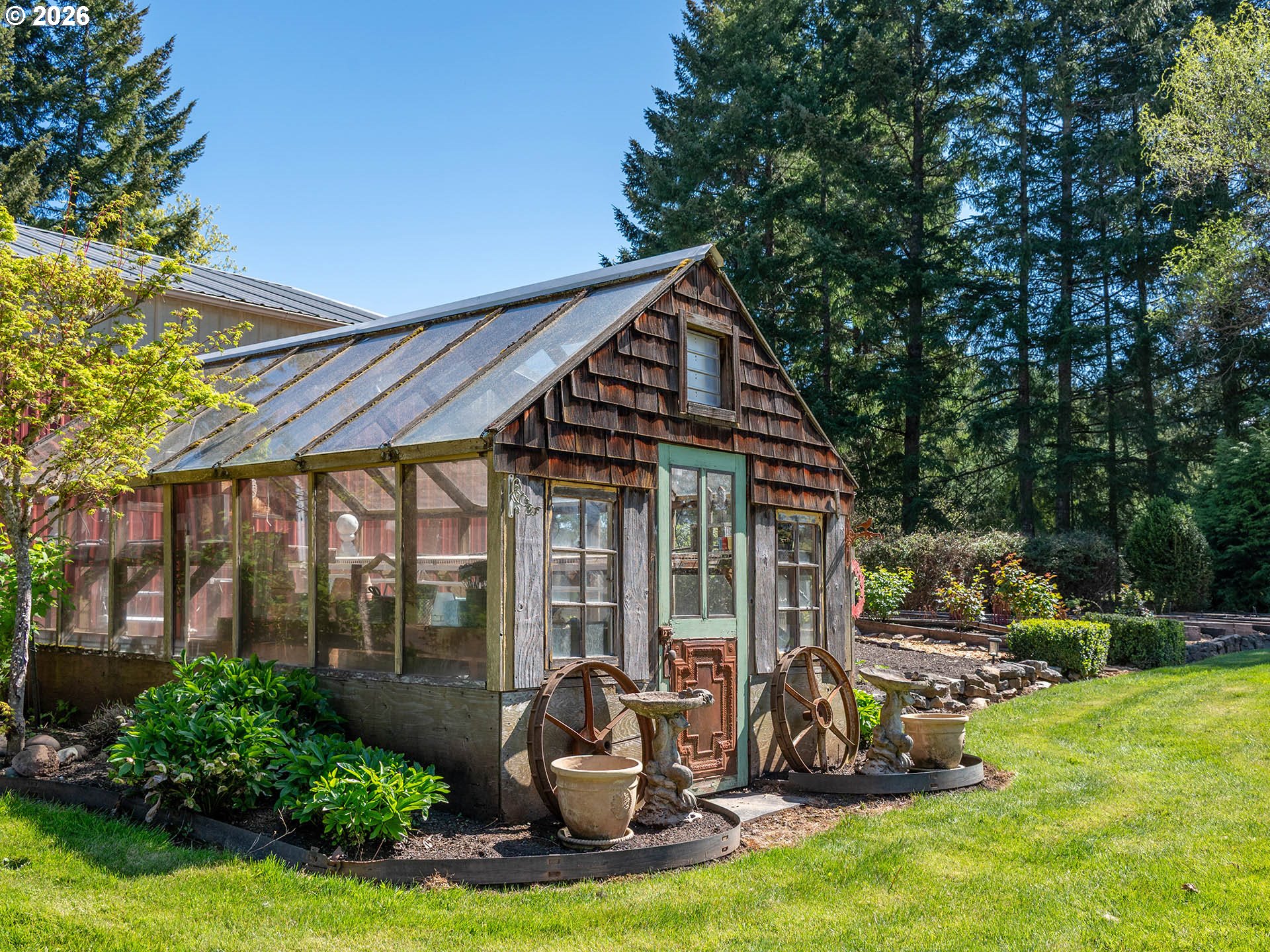 45045 Northwest Elk Mountain Road Banks, OR 97106 - Photo 36 of 48 a view of a chair and table in backyard of the house