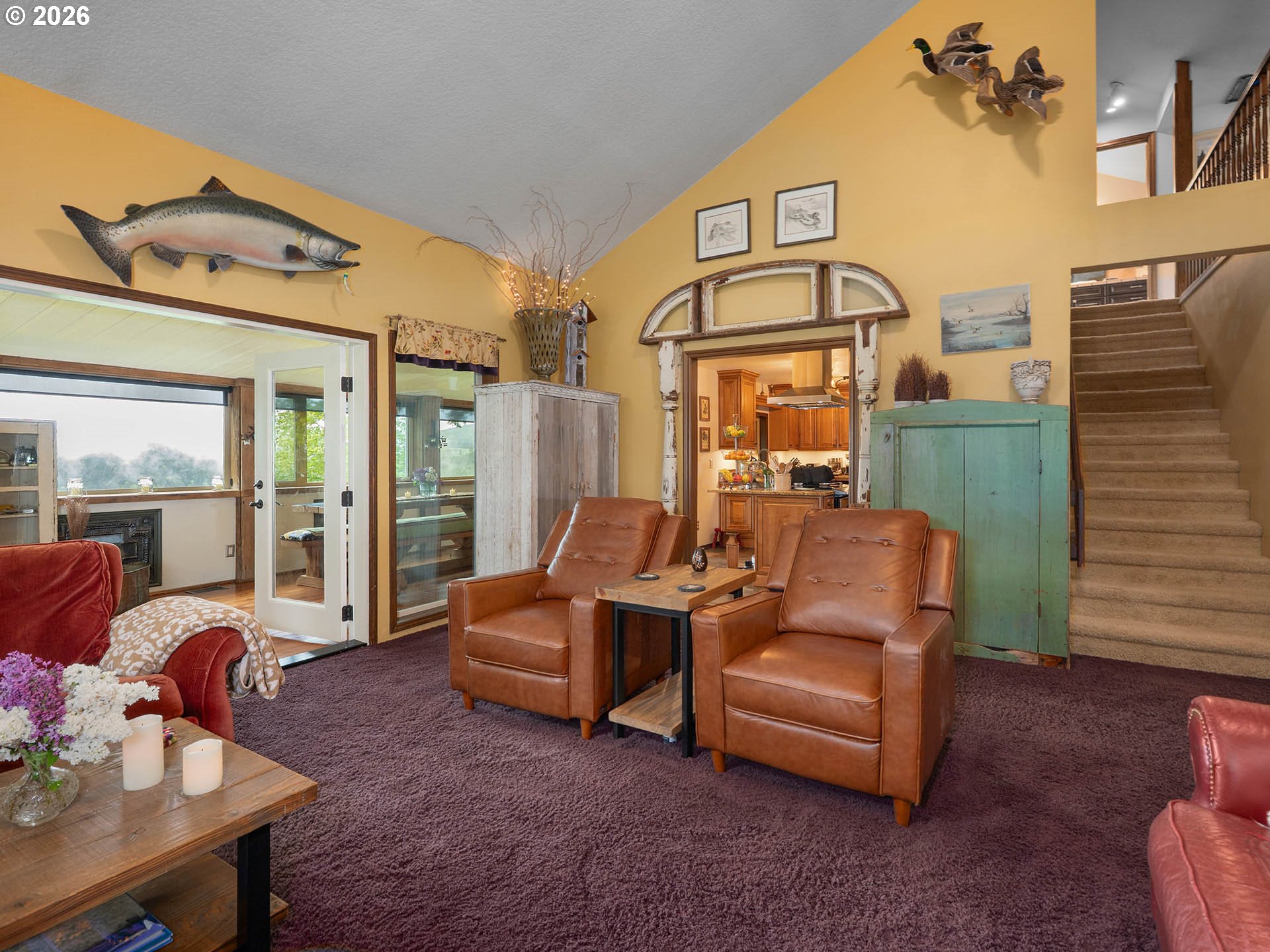 45045 Northwest Elk Mountain Road Banks, OR 97106 - Photo 9 of 48 a living room with furniture and a floor to ceiling window
