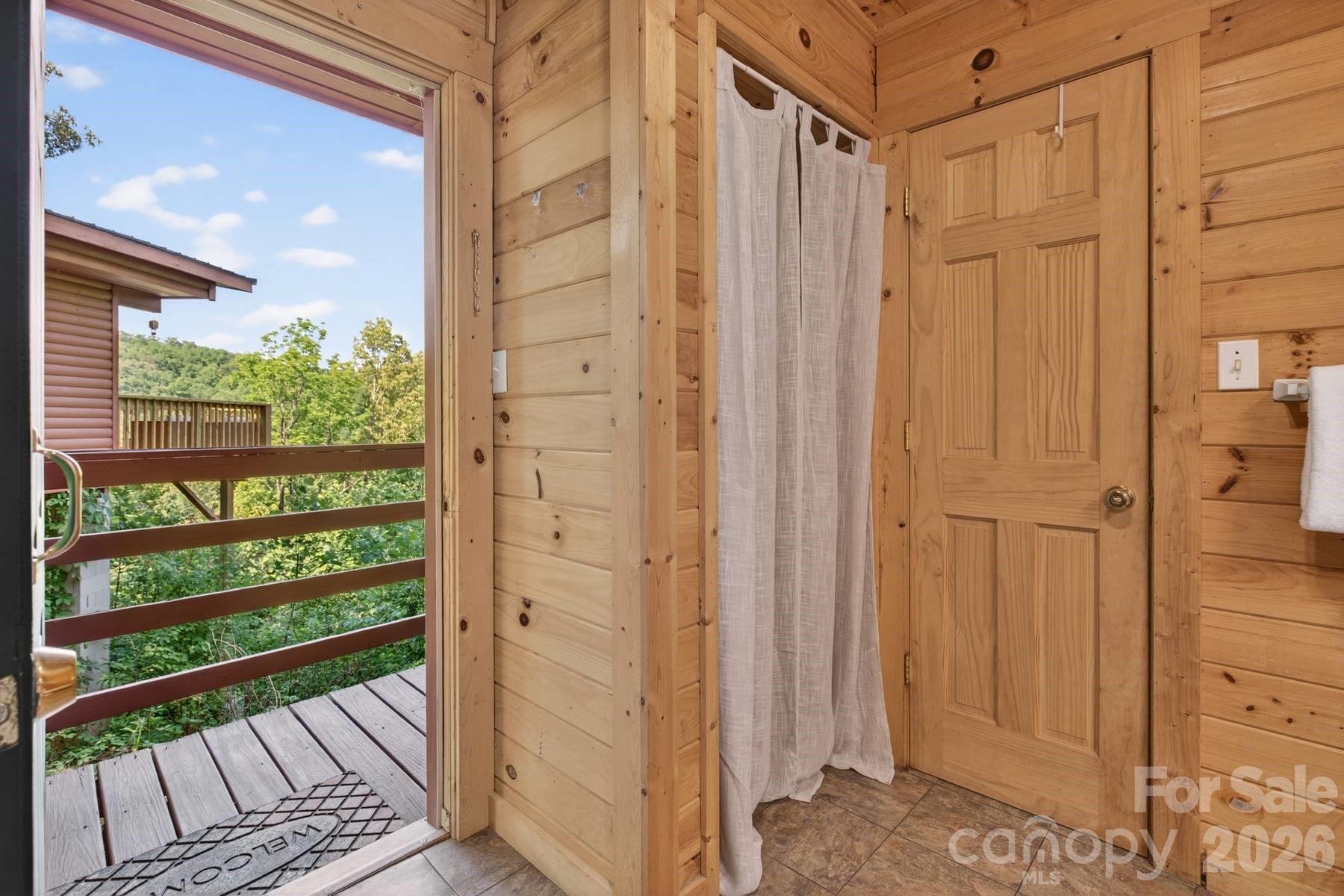 319 Blue Ridge Parkway, Unit 53 Bryson City, NC 28713 - Photo 14 of 22 a view of a balcony with wooden floor