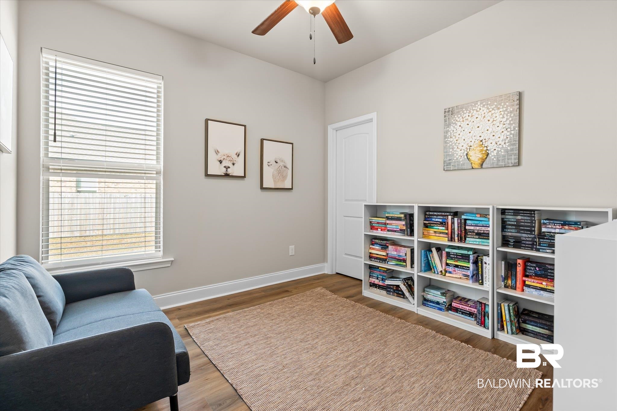 1116 Stella Road Foley, AL 36535 - Photo 19 of 29 Living area featuring ceiling fan and hardwood / wood-style floors