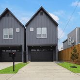 a front view of house with garage