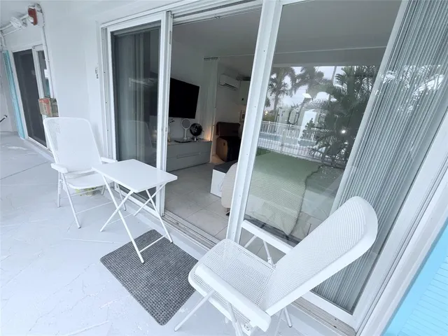 a view of a backyard with a garden and plants