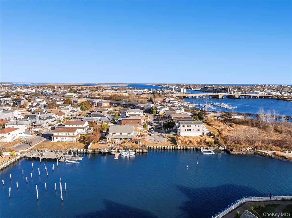 4 Quebec Road Island Park, NY 11558 - Photo 20 of 24 an aerial view of a house with a lake view