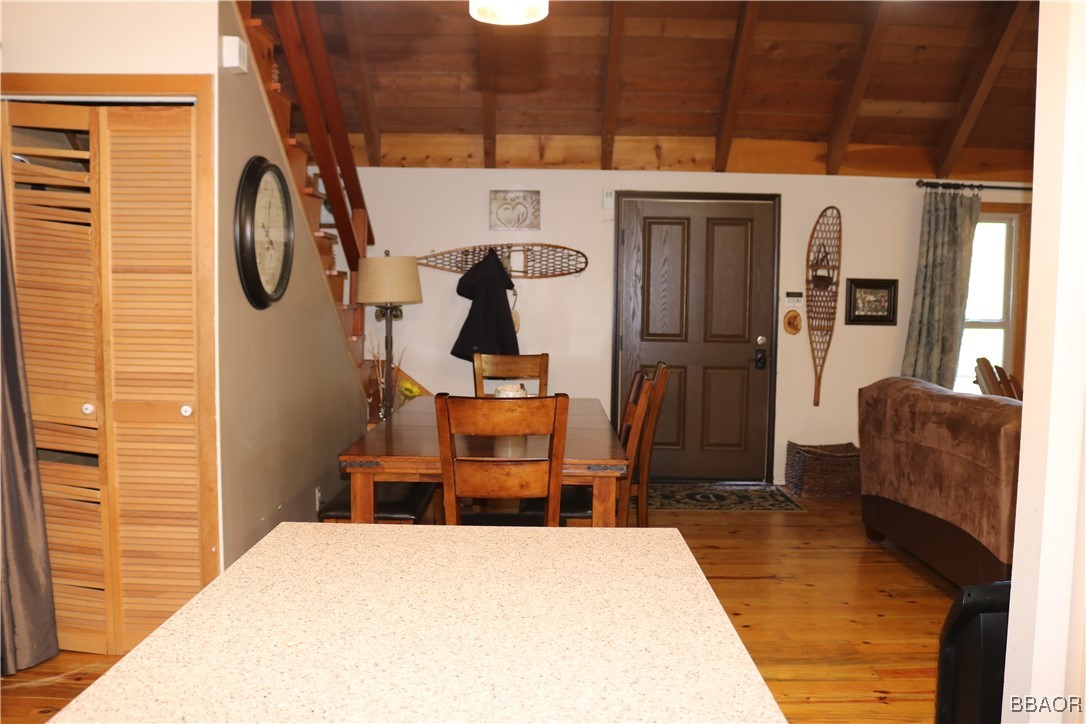 21 Holcomb Valley Road Fawnskin, CA 92333 - Photo 16 of 24 Looking from the kitchen island to the dining area and front door