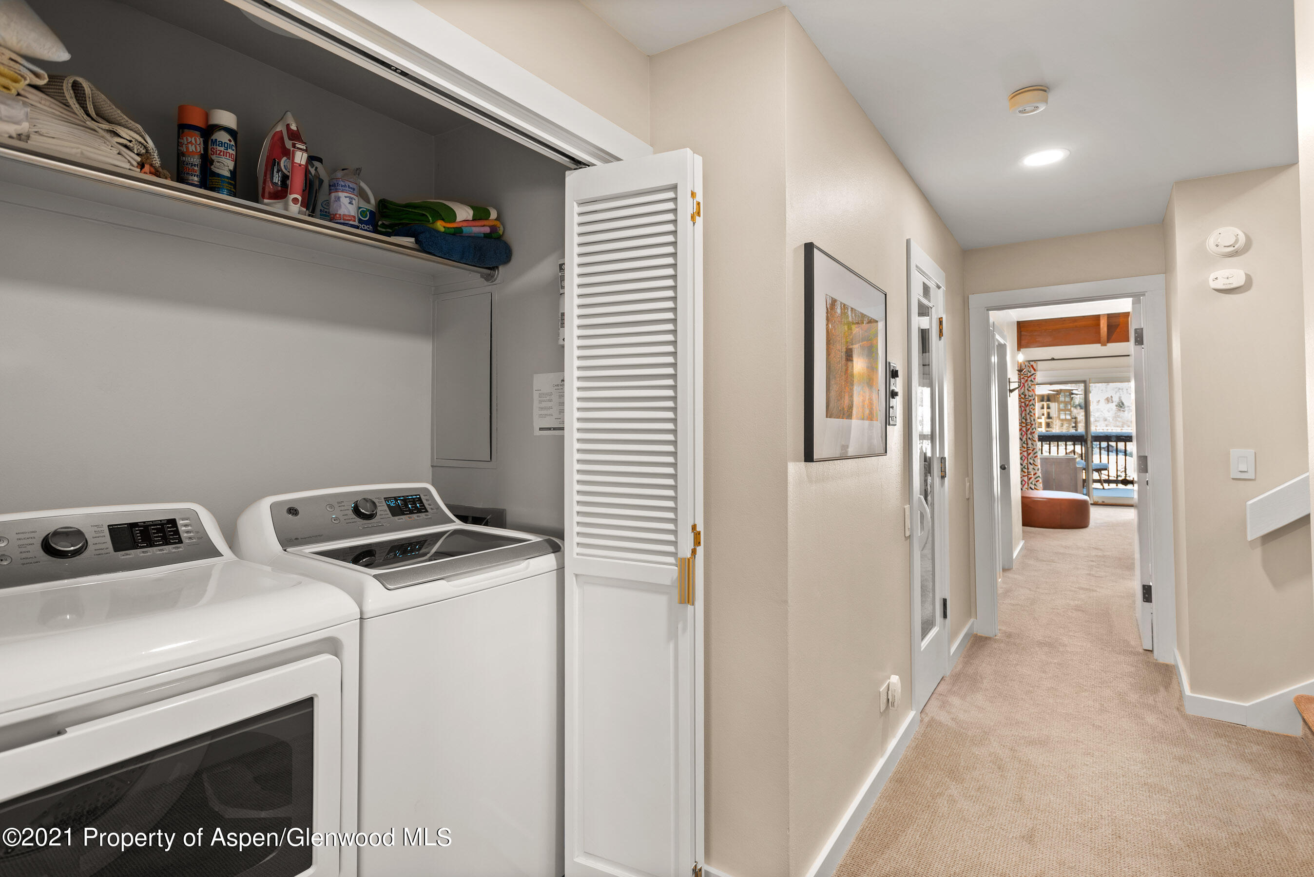 810 Ridge Road, Unit 2 Snowmass Village, CO 81615 - Photo 17 of 31 a view of kitchen and utility room with closet