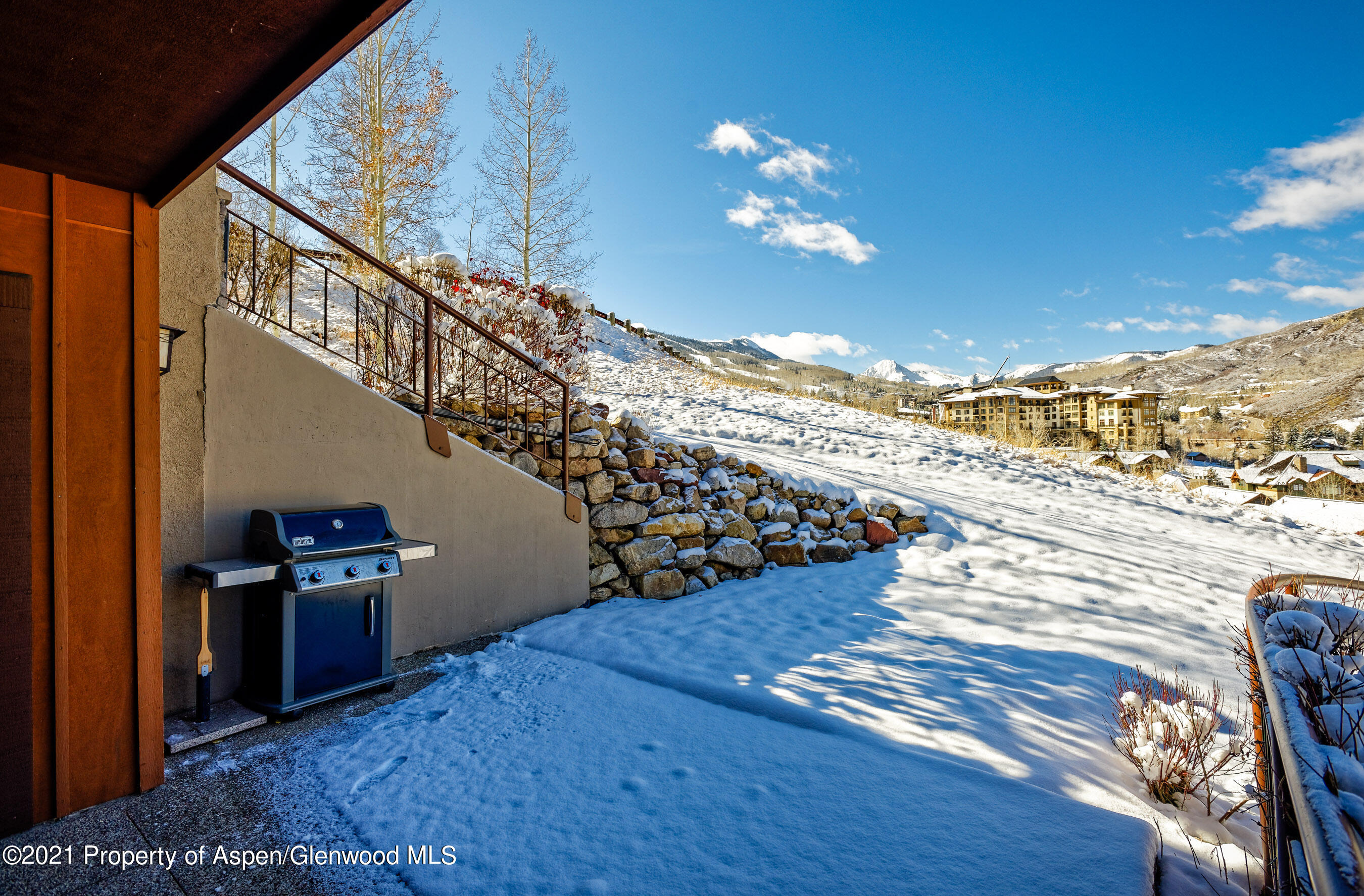 810 Ridge Road, Unit 2 Snowmass Village, CO 81615 - Photo 19 of 31 a view of a livingroom with wooden floor